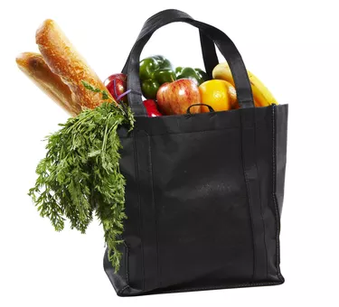 Bag of groceries on white background