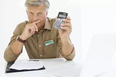 Financial adviser with calculator