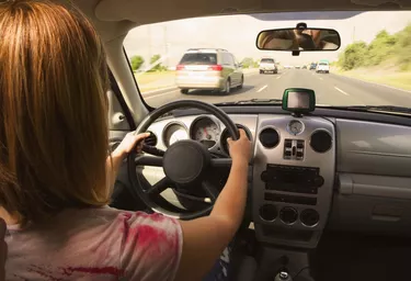 Woman driving car