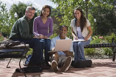 Students with professor on campus