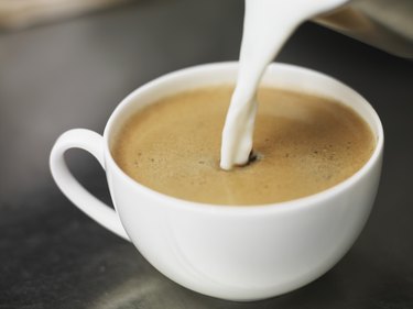 Pouring Milk into Coffee