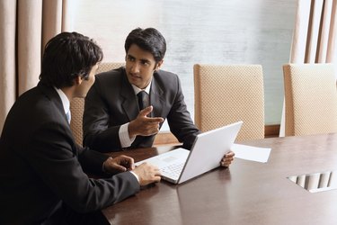 Businessmen with laptop computer