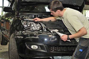 Car damage examining.