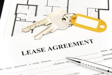 Lease agreement document with keys