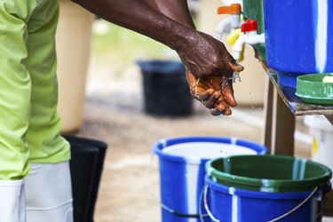 West African Nurse Washing Hands