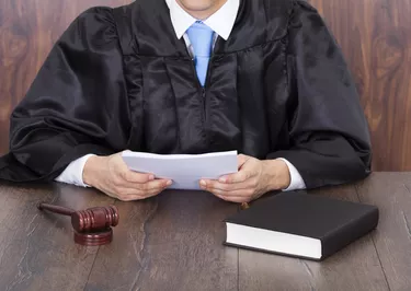 Judge Holding Documents