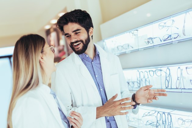 Optician selling glasses at the optics