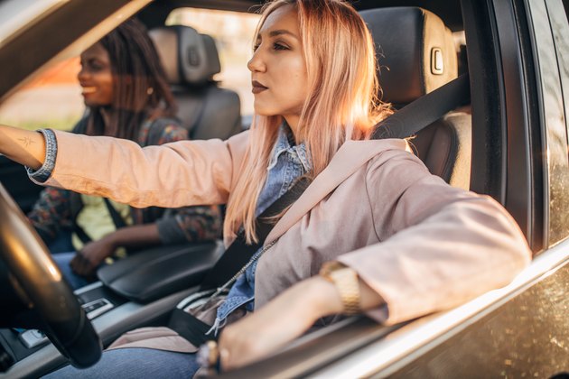 Girlfriends riding in a car together