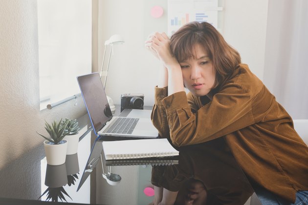 woman get stress from covid19 ,coronavirus pandemic . expense and payment problem . stay home order concept.