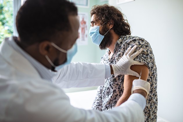 Young man getting vaccinated