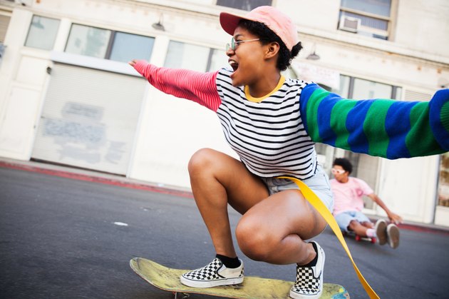 Young woman skateboarding