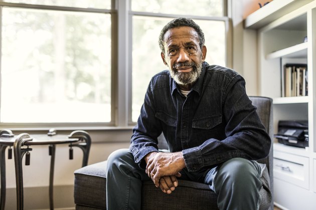 Portrait of senior man at home