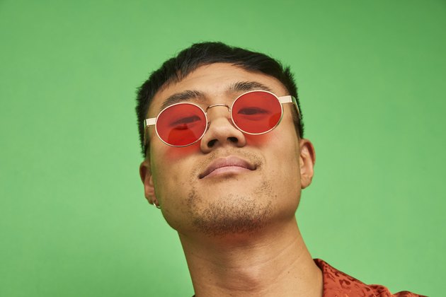 Colourful studio portrait of a young man