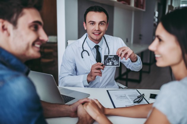 Couple with doctor.