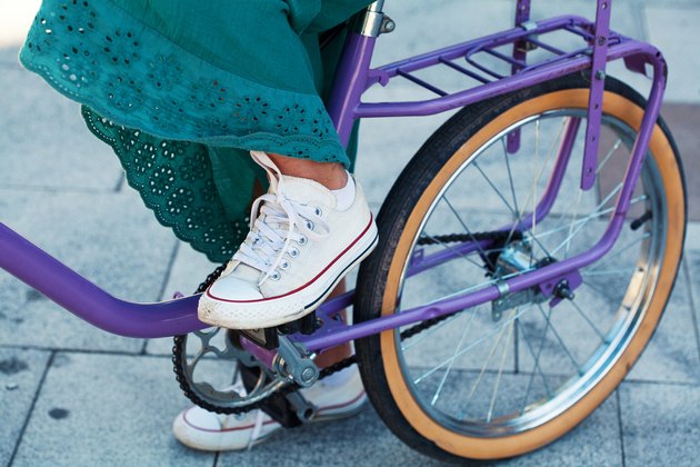 Young woman riding a bike