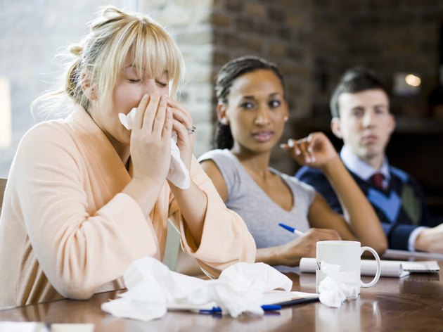 woman sick at work
