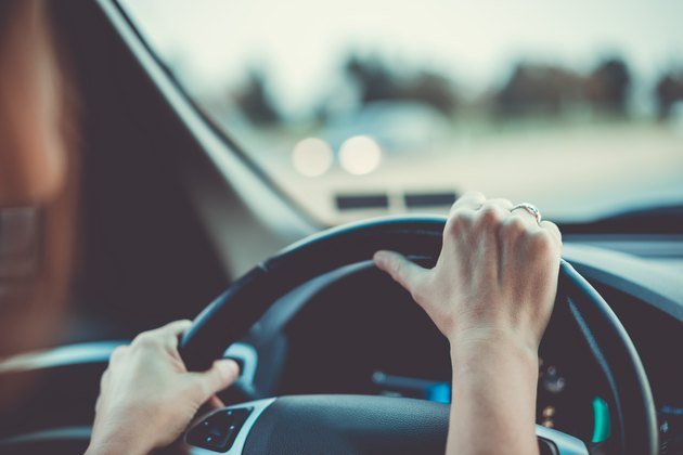 Woman driving car or SUV