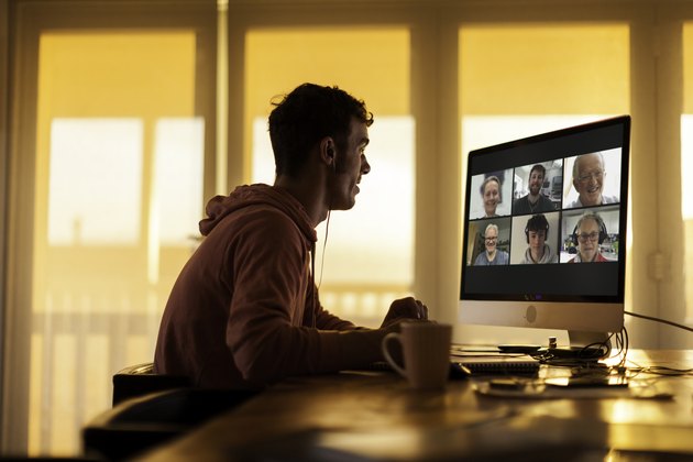 Student talking to his family on video call from his home during lockdown