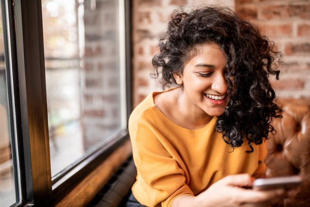 Using mobile phone.