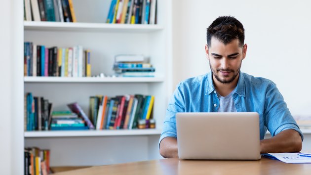 man working with computer