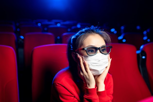 sick person cinema mask watch movie public virus