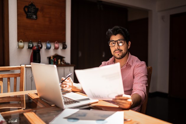 Portrait of a mid adult man working from home