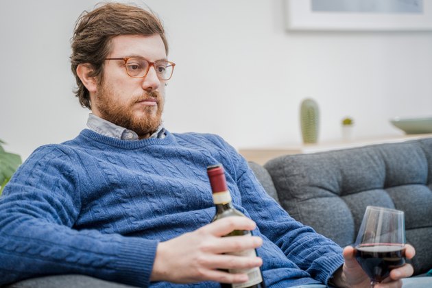 Sad depressed addicted drunk guy having problem