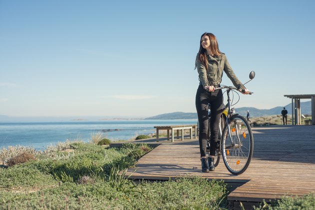 Young woman with the bicycle
