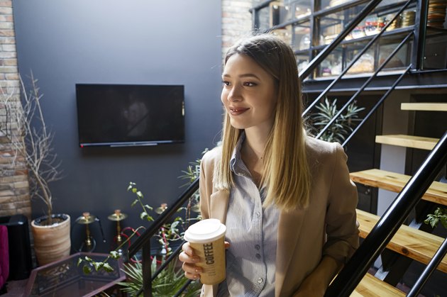Businesswoman in office looking away