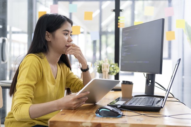 Programmers and developer teams are coding and developing softwa