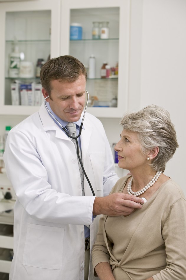 Doctor examining patient