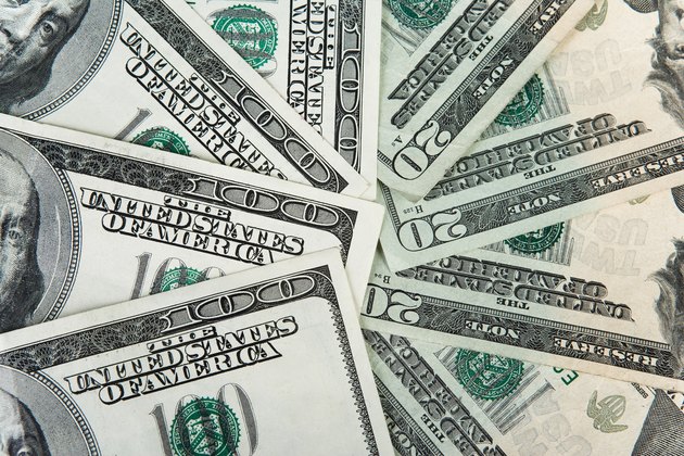 Close-up of one hundred and twenty dollar bills
