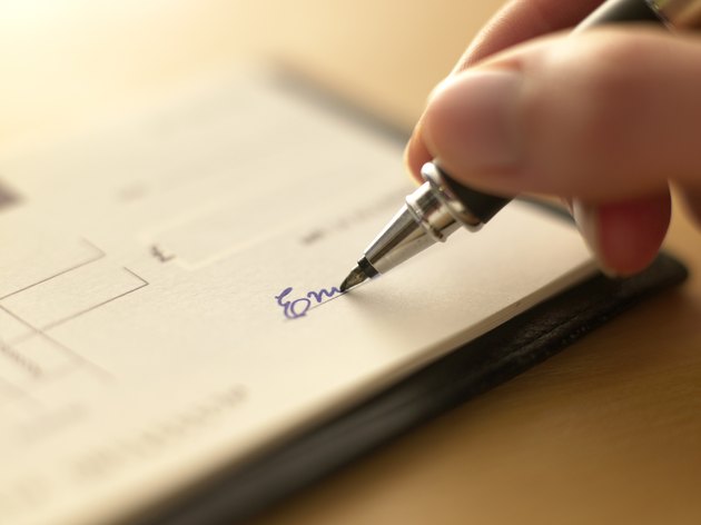 Person writing check