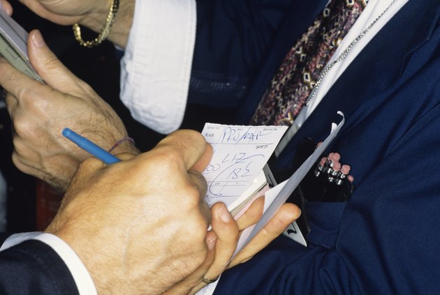New York Stock Exchange transactions, close-up of traders hands