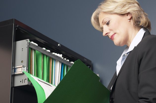 Woman reading file