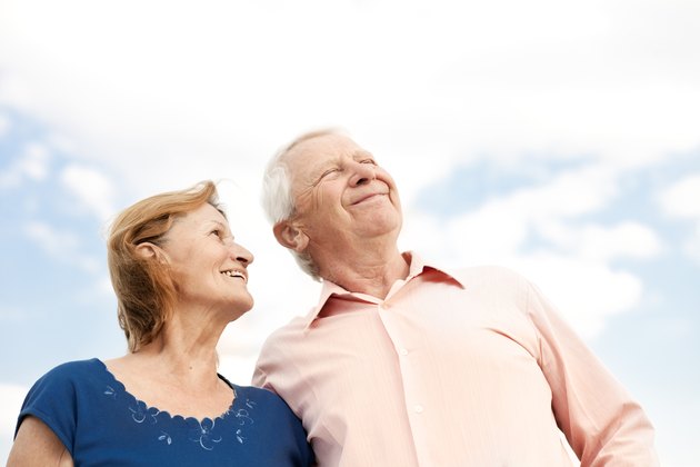 seniors in front of clouds 2