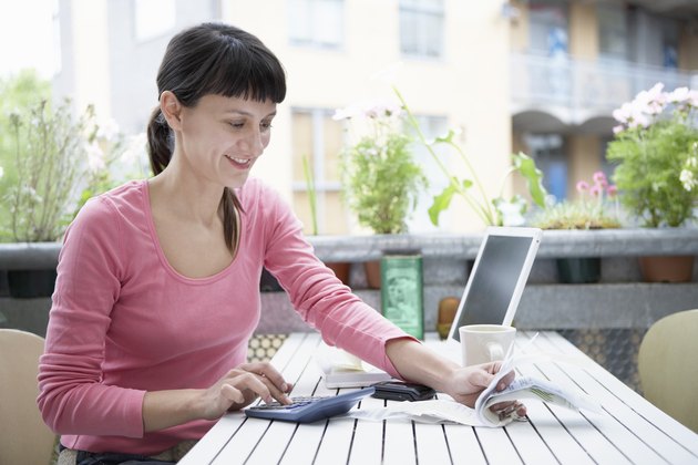 Woman Examining Expenses
