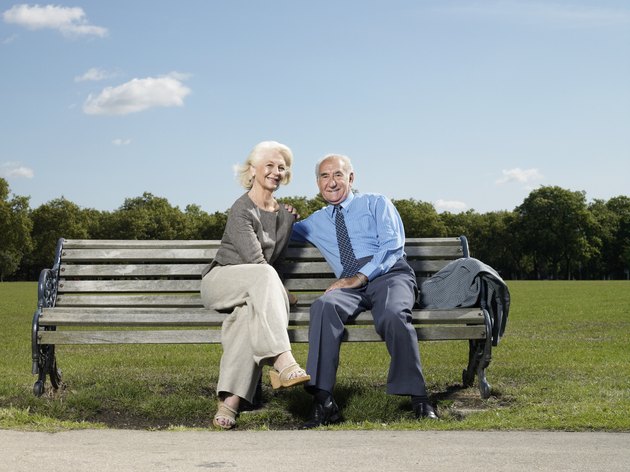 Elderly couple on a park bench