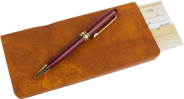 Checkbook and pen