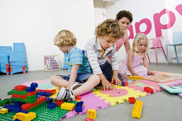 Teacher playing with students