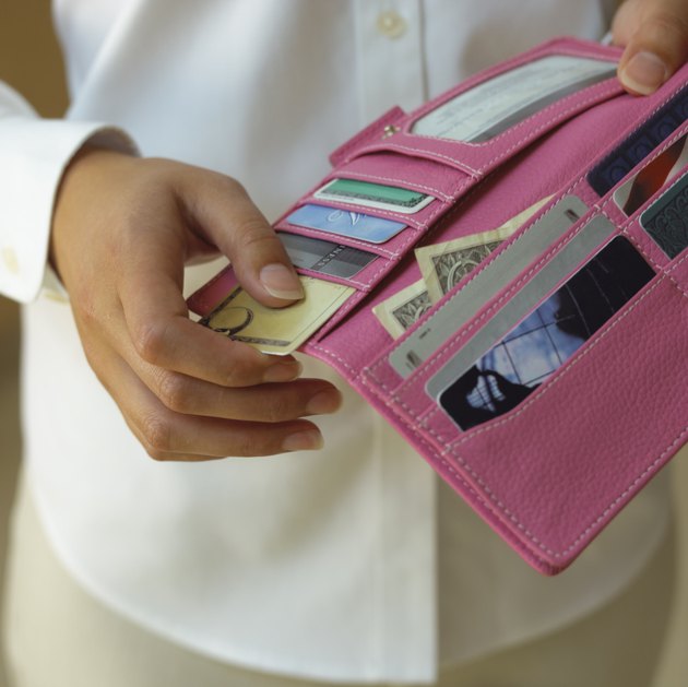 Hands holding woman's wallet