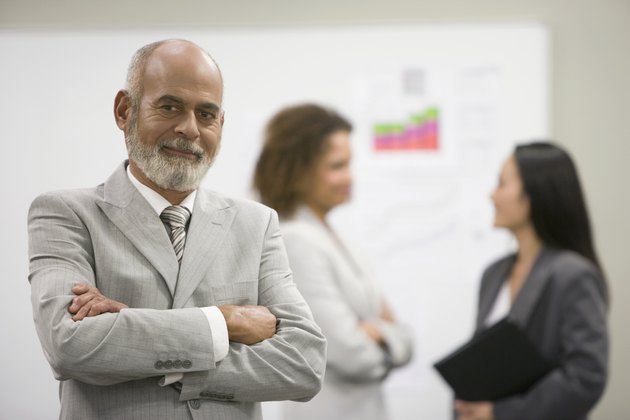 Senior African businessman with arms crossed