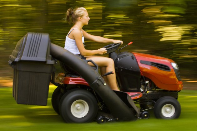 Teenager Mowing the Lawn