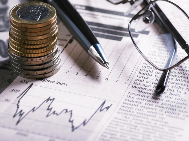 Financial Chart with Glasses And Coins
