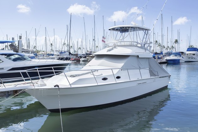 Marina with luxury yachts and white boats