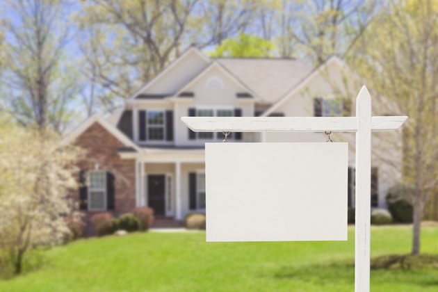 Blank Real Estate Sign in Front of New House