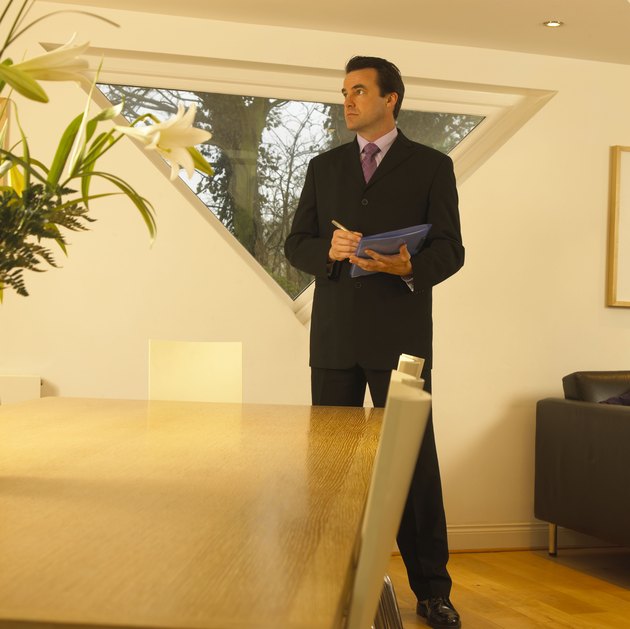 Man inspecting house