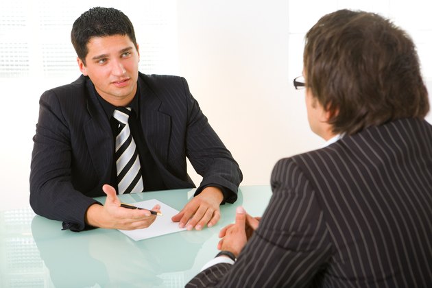 Businessmen in conference room
