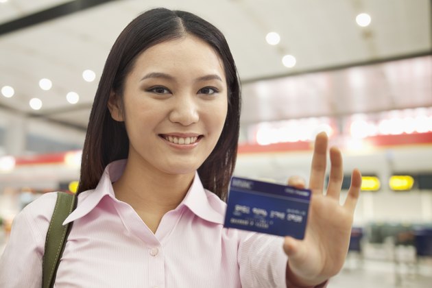 Businesswoman Showing Credit Card