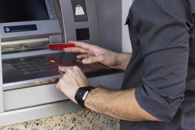 Businessman holding a credit card